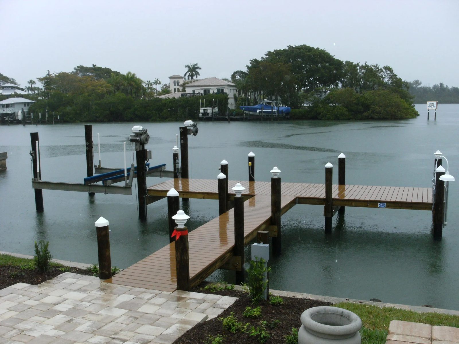 Composite deck dock with walkway, pile caps and dock lights