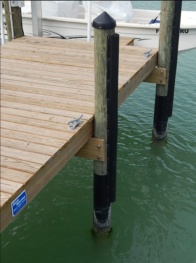 Dock cleats and black pile caps